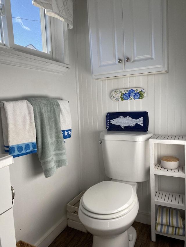 bathroom featuring toilet and hardwood / wood-style floors