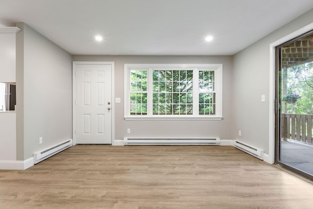 1029 Iyannough Rd Unit 9B, Hyannis, MA 02601 - foyer entrance featuring a baseboard heating unit, light wood finished floors, recessed lighting, and baseboards