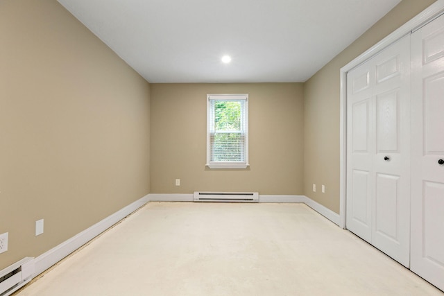 1029 Iyannough Rd Unit 9B, Hyannis, MA 02601 - unfurnished bedroom with a baseboard heating unit, baseboards, recessed lighting, a closet, and baseboard heating