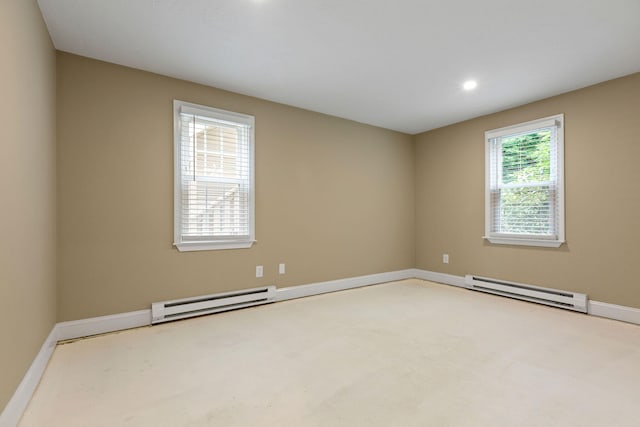 1029 Iyannough Rd Unit 9B, Hyannis, MA 02601 - spare room featuring a baseboard heating unit, baseboards, and recessed lighting