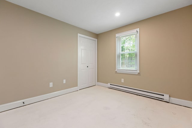 1029 Iyannough Rd Unit 9B, Hyannis, MA 02601 - unfurnished bedroom featuring baseboard heating, baseboards, a closet, and recessed lighting