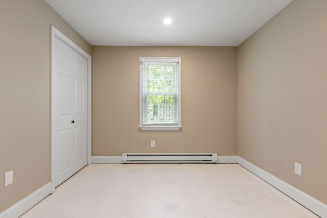1029 Iyannough Rd Unit 9B, Hyannis, MA 02601 - unfurnished bedroom with baseboard heating, baseboards, a closet, and recessed lighting