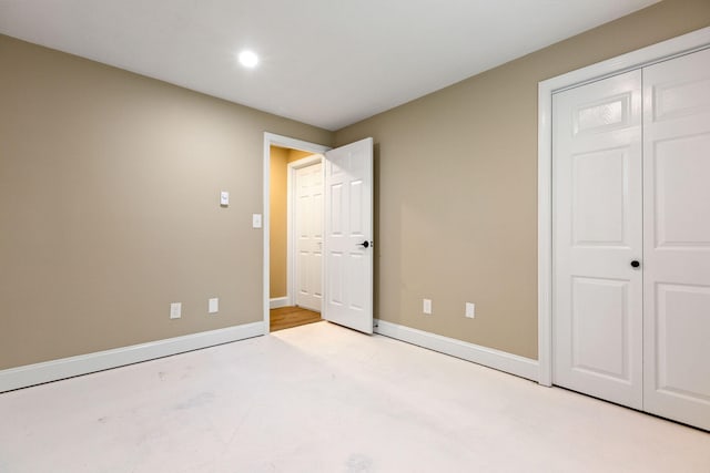 1029 Iyannough Rd Unit 9B, Hyannis, MA 02601 - unfurnished bedroom featuring baseboards, a closet, and recessed lighting
