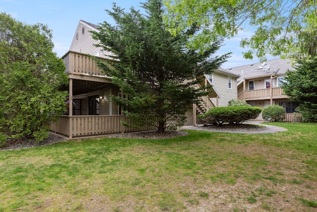 1029 Iyannough Rd Unit 9B, Hyannis, MA 02601 - view of grassy yard with stairs