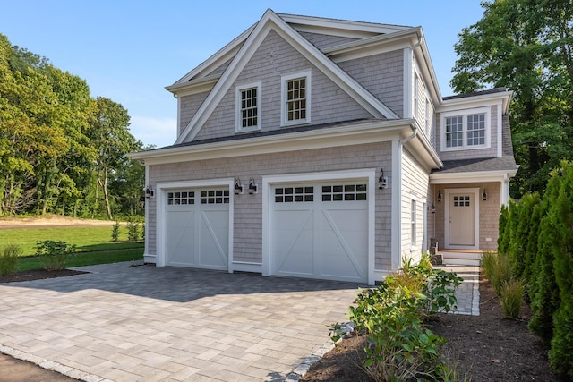 view of front facade with decorative driveway