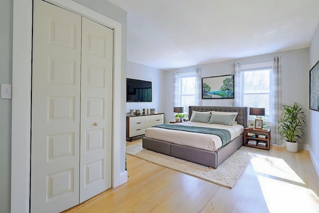 bedroom with light hardwood / wood-style flooring