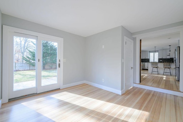 empty room featuring light wood-type flooring