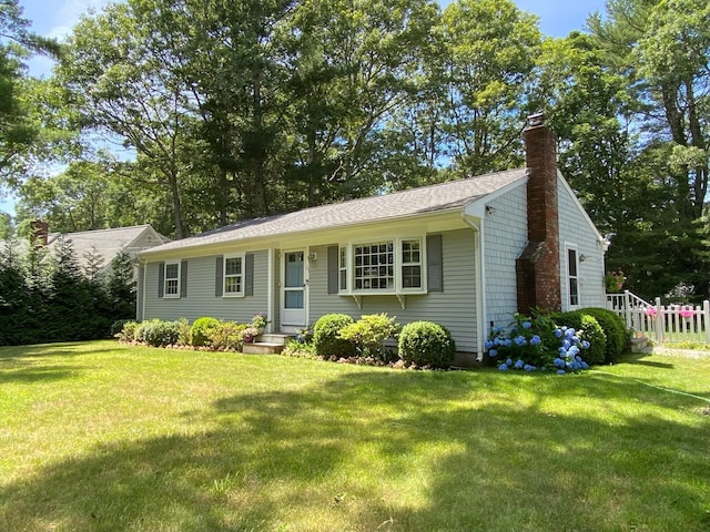 single story home with a front yard