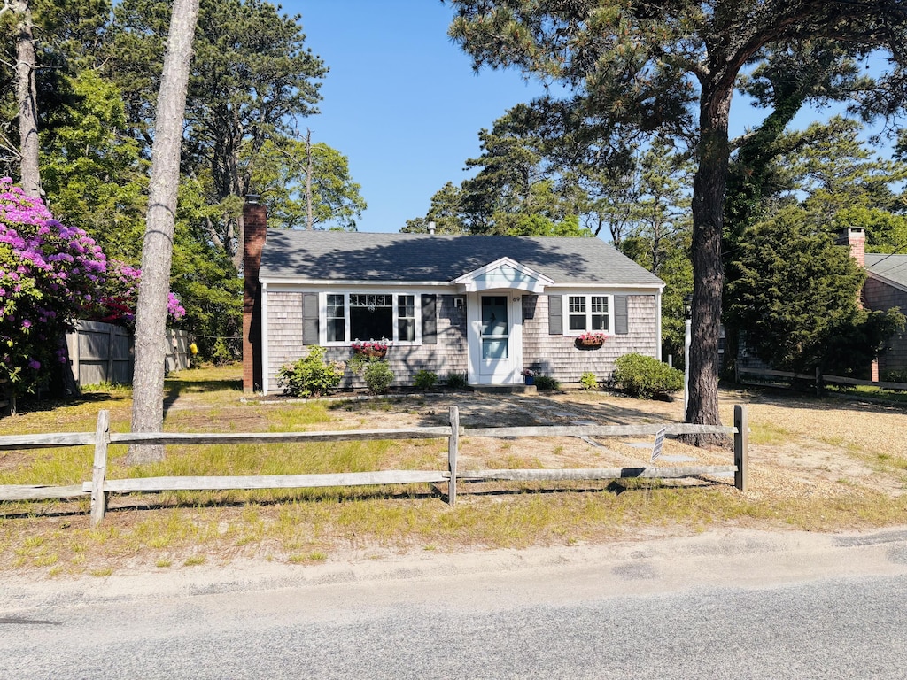 69 Captain Chase Rd, Dennis Port, MA 02639 - view of front of property featuring a chimney