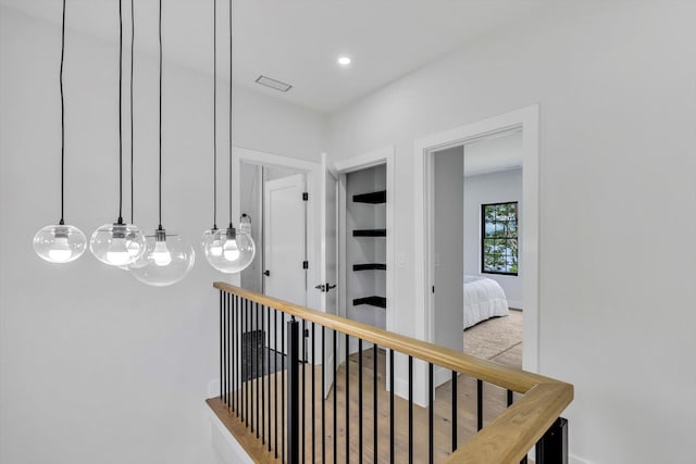 2 Buttercup Ln, South Yarmouth, MA 02664 - corridor featuring built in shelves and recessed lighting