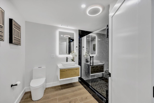 2 Buttercup Ln, South Yarmouth, MA 02664 - full bathroom featuring vanity, a stall shower, and wood finished floors