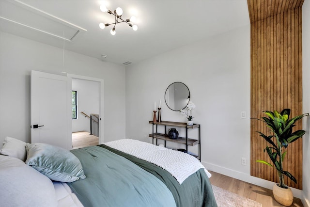 2 Buttercup Ln, South Yarmouth, MA 02664 - bedroom featuring attic access and wood finished floors