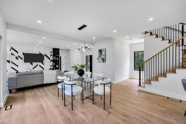 2 Buttercup Ln, South Yarmouth, MA 02664 - dining space featuring stairs, light wood-type flooring, recessed lighting, and a chandelier