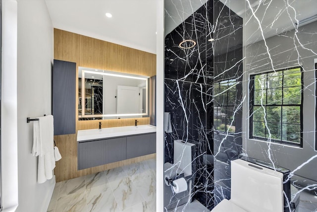2 Buttercup Ln, South Yarmouth, MA 02664 - bathroom featuring marble tiled flooring, double vanity, recessed lighting, stone wall, and a marble finish shower