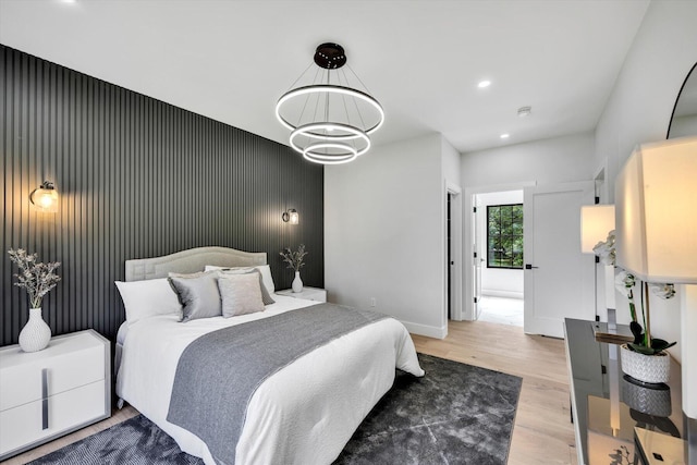 2 Buttercup Ln, South Yarmouth, MA 02664 - bedroom with an accent wall, wood finished floors, and recessed lighting
