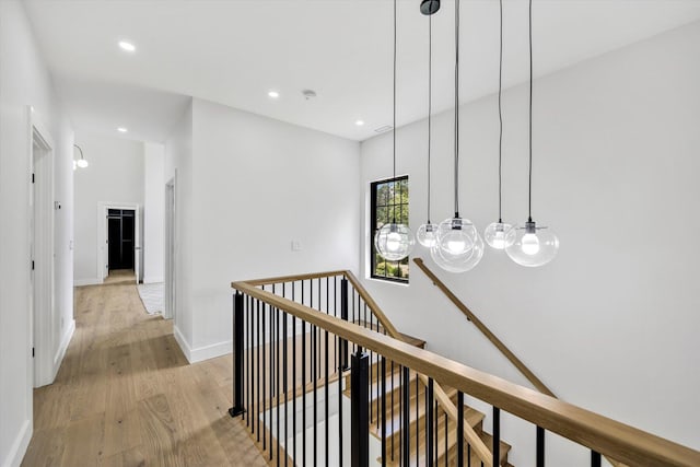 2 Buttercup Ln, South Yarmouth, MA 02664 - hallway with an upstairs landing, light wood-style flooring, recessed lighting, and a chandelier