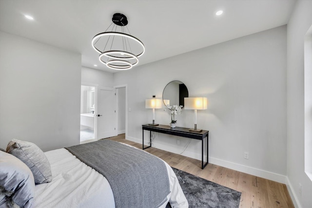 2 Buttercup Ln, South Yarmouth, MA 02664 - bedroom featuring a chandelier, wood finished floors, and recessed lighting