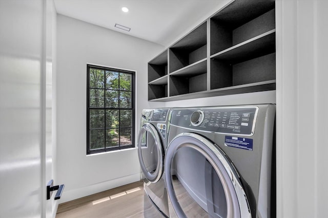 2 Buttercup Ln, South Yarmouth, MA 02664 - washroom with separate washer and dryer, light wood finished floors, and recessed lighting