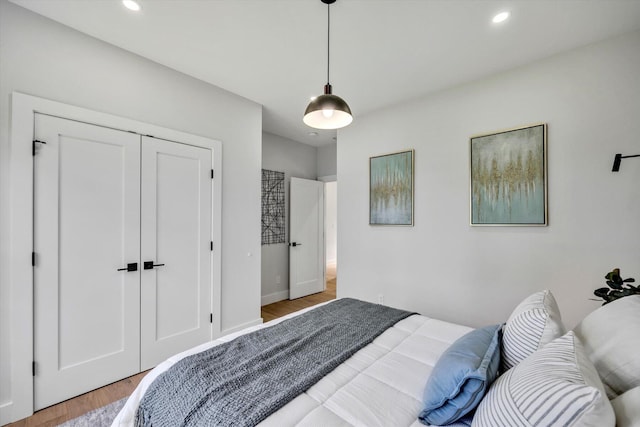 2 Buttercup Ln, South Yarmouth, MA 02664 - bedroom featuring wood finished floors, recessed lighting, and a closet