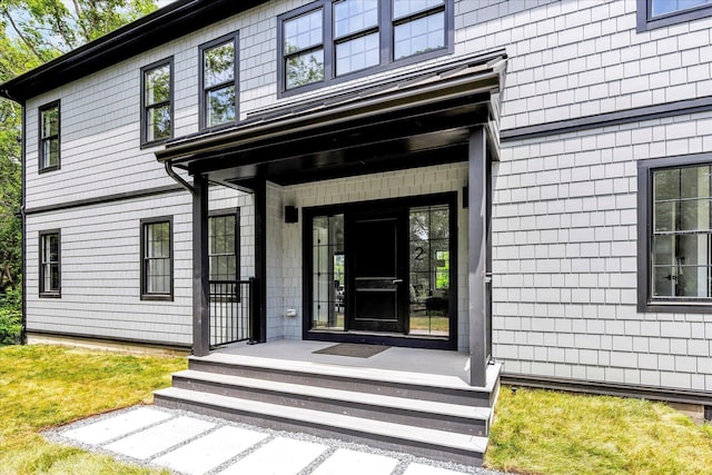 2 Buttercup Ln, South Yarmouth, MA 02664 - property entrance with a yard