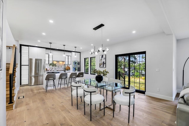 2 Buttercup Ln, South Yarmouth, MA 02664 - dining space with recessed lighting, light wood-type flooring, stairway, and a chandelier