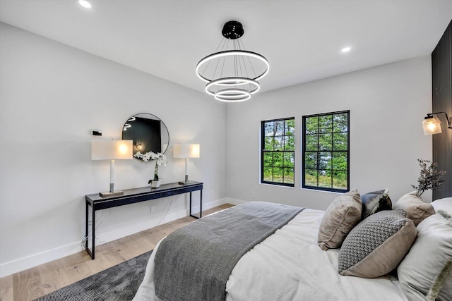 2 Buttercup Ln, South Yarmouth, MA 02664 - bedroom with recessed lighting, wood finished floors, and a chandelier