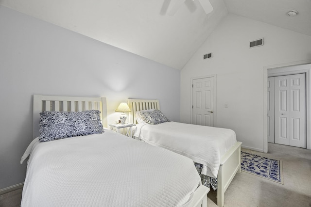 bedroom with visible vents, carpet, ceiling fan, and high vaulted ceiling