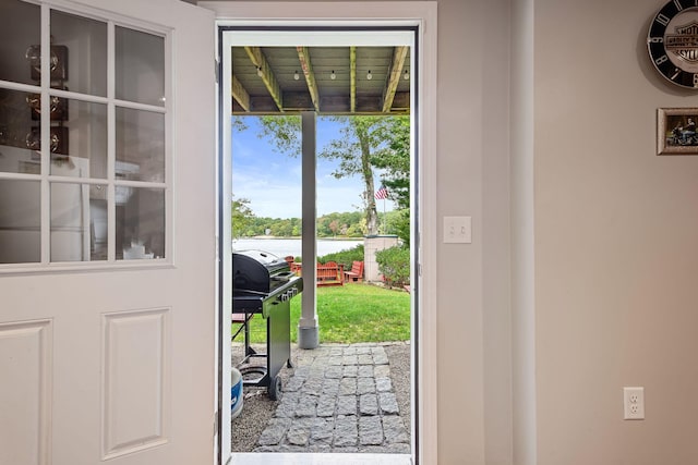entryway featuring a water view