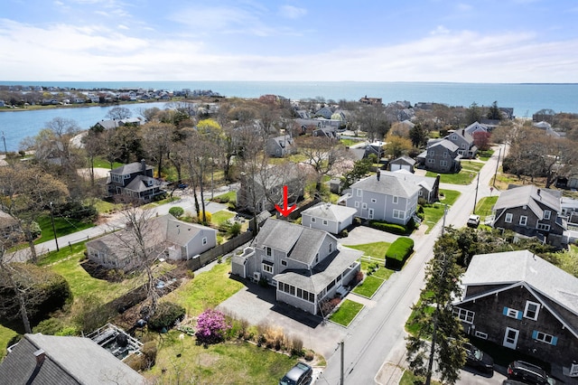 aerial view with a water view and a residential view