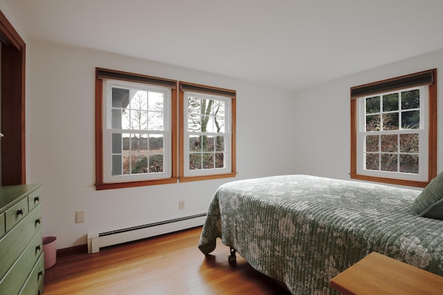 72 Lookout Rd, Yarmouth Port, MA 02675 - bedroom featuring baseboard heating and light wood-type flooring