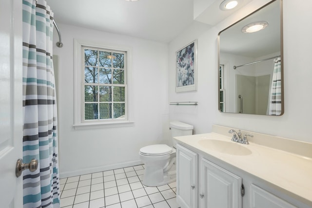 full bathroom featuring a shower with shower curtain, baseboards, toilet, vanity, and tile patterned flooring