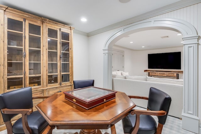 office space with ornamental molding and decorative columns