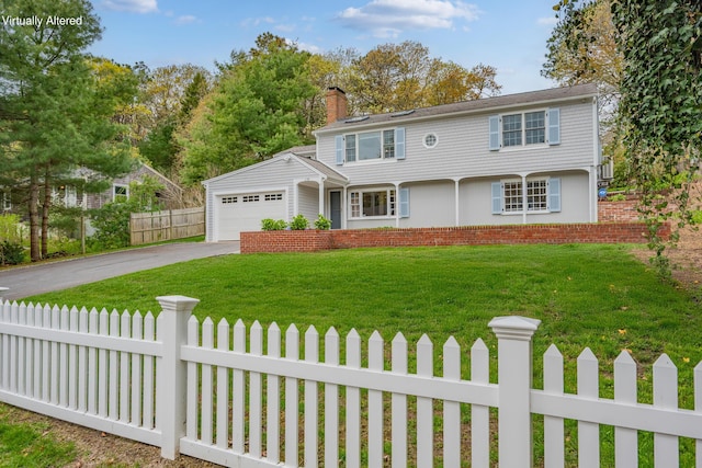 359 Lake Elizabeth Dr, Centerville, MA 02632 - colonial house featuring a fenced front yard, asphalt driveway, an attached garage, and a chimney