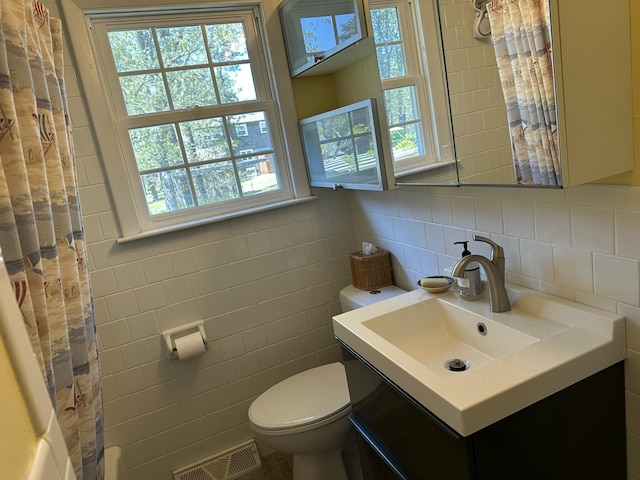25 Day Rd, Wellfleet, MA 02667 - bathroom featuring tile walls, plenty of natural light, toilet, and vanity