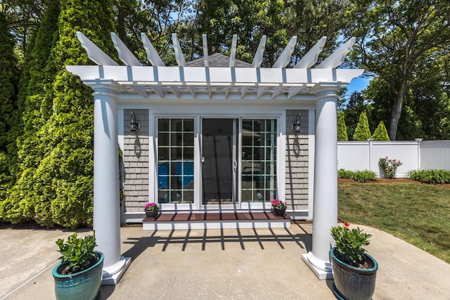 335 Falmouth Woods Rd, East Falmouth, MA 02536 - view of exterior entry with a pergola