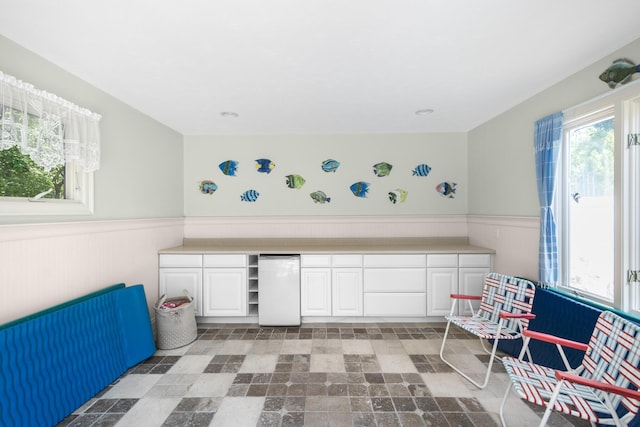 335 Falmouth Woods Rd, East Falmouth, MA 02536 - interior space featuring a wainscoted wall and built in study area