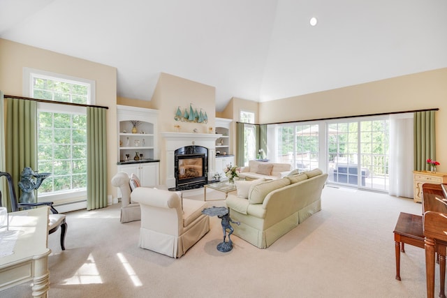 335 Falmouth Woods Rd, East Falmouth, MA 02536 - living area with light carpet, a fireplace, and high vaulted ceiling