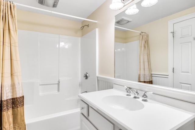 335 Falmouth Woods Rd, East Falmouth, MA 02536 - full bath with shower / bath combo, vanity, and a wainscoted wall