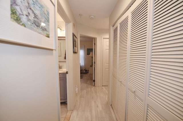 hall featuring light hardwood / wood-style floors