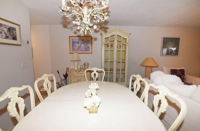 dining room featuring a notable chandelier