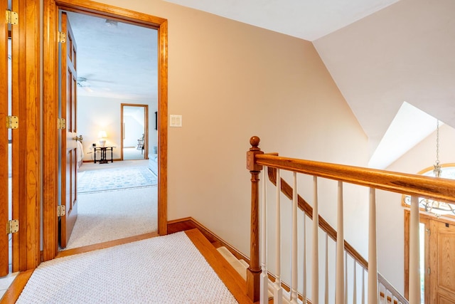 30 Monomessat Way, Chatham, MA 02633 - hallway featuring light colored carpet, an upstairs landing, and vaulted ceiling