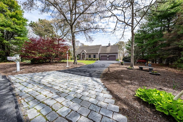 30 Monomessat Way, Chatham, MA 02633 - view of front of property with driveway and a garage