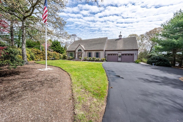30 Monomessat Way, Chatham, MA 02633 - view of front of house with driveway, an attached garage, and a front yard