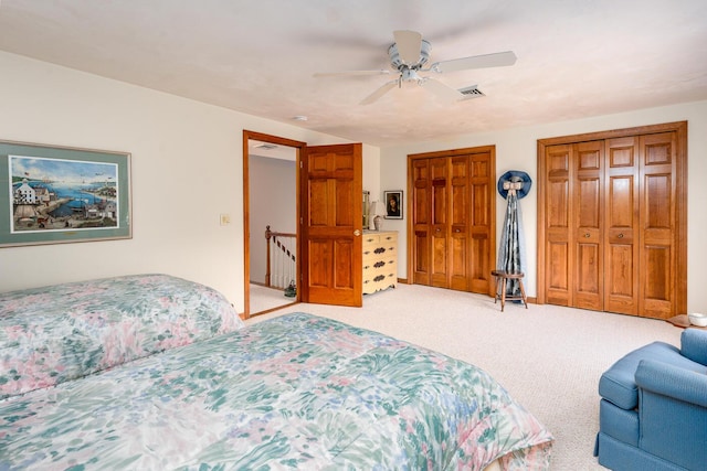 30 Monomessat Way, Chatham, MA 02633 - bedroom featuring multiple closets, light colored carpet, and a ceiling fan