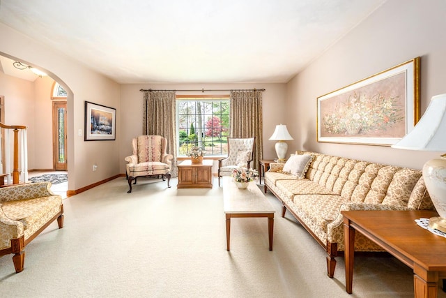 30 Monomessat Way, Chatham, MA 02633 - living room featuring arched walkways, carpet floors, and baseboards