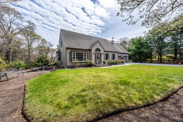 30 Monomessat Way, Chatham, MA 02633 - view of front of home featuring driveway, an attached garage, a front lawn, and a shingled roof