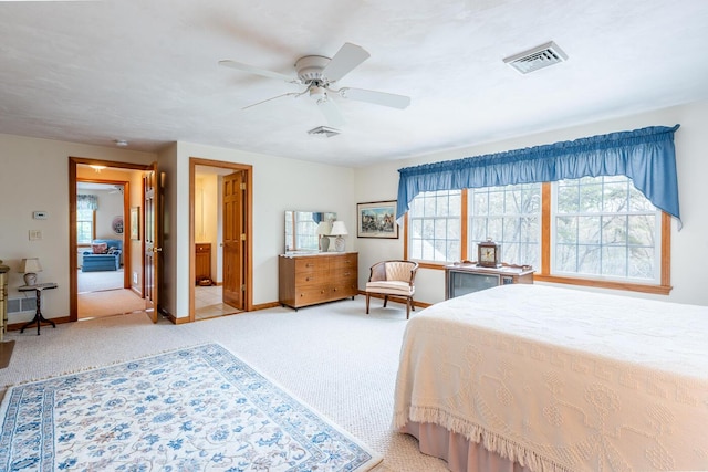 30 Monomessat Way, Chatham, MA 02633 - carpeted bedroom featuring multiple windows, baseboards, and a ceiling fan