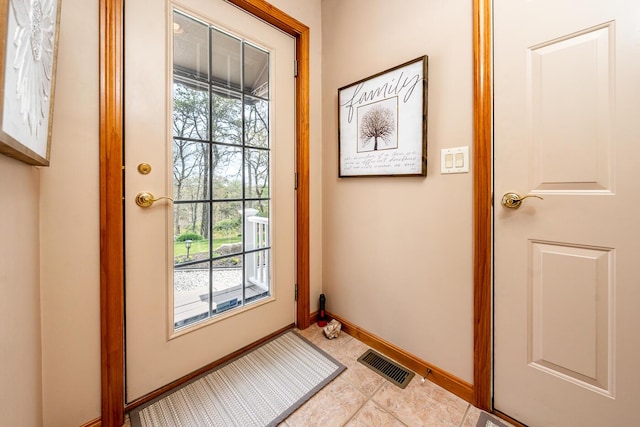 30 Monomessat Way, Chatham, MA 02633 - doorway featuring plenty of natural light, baseboards, and light tile patterned floors