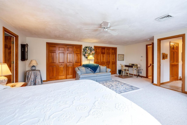 30 Monomessat Way, Chatham, MA 02633 - bedroom with two closets, carpet floors, baseboards, and a ceiling fan