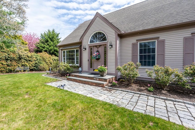 30 Monomessat Way, Chatham, MA 02633 - view of front of home with a front yard and roof with shingles